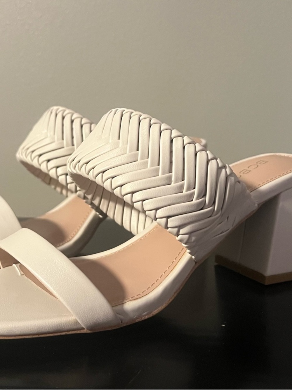 BCBG  Woven Strap Block Heel Mules in the color Bone